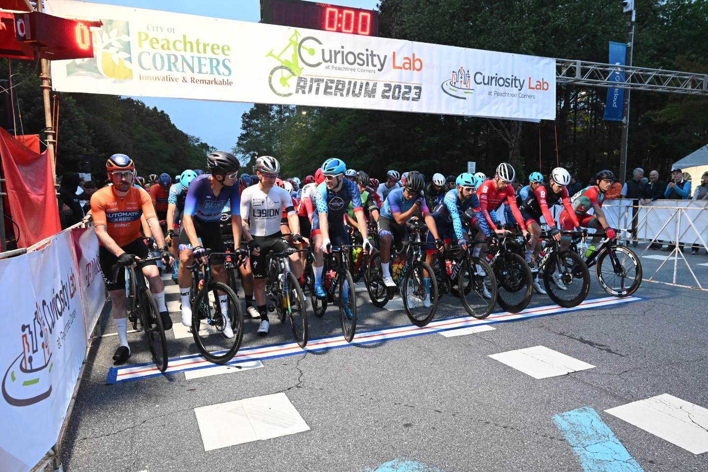 At the starting line of Criterium 2023, a pro cycling event hosted by the Curiosity Lab of Peachtree Corners, Ga.