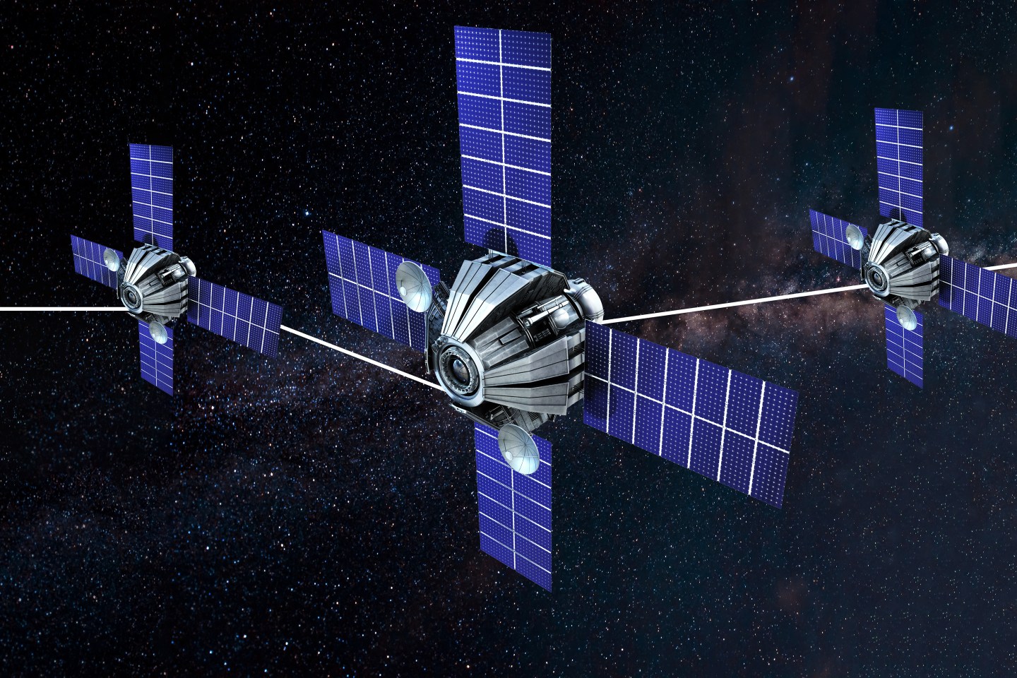 Photo illustration of satellites in space connected with a line.