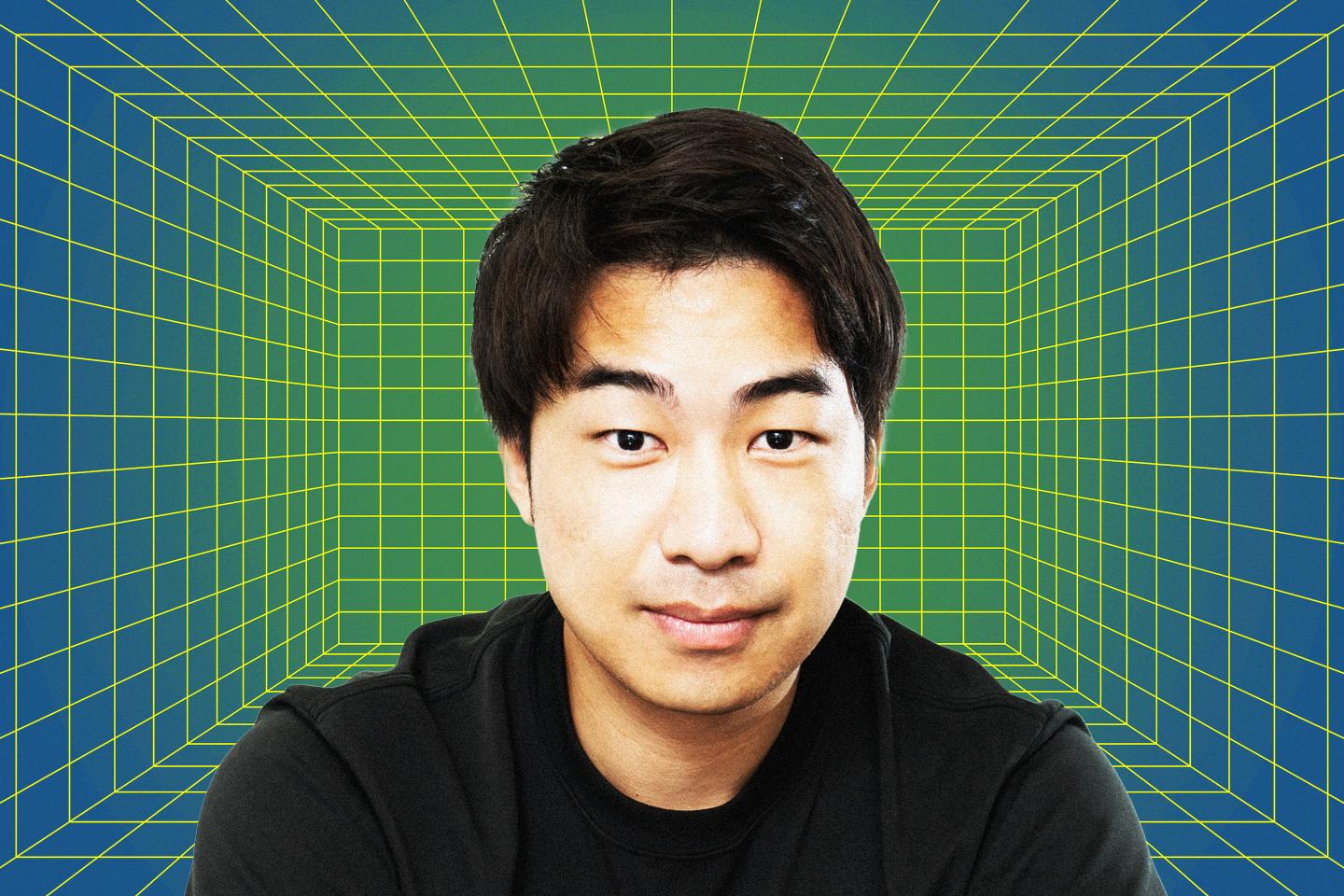 Sota Watanbe sits in front of a computer-y background.