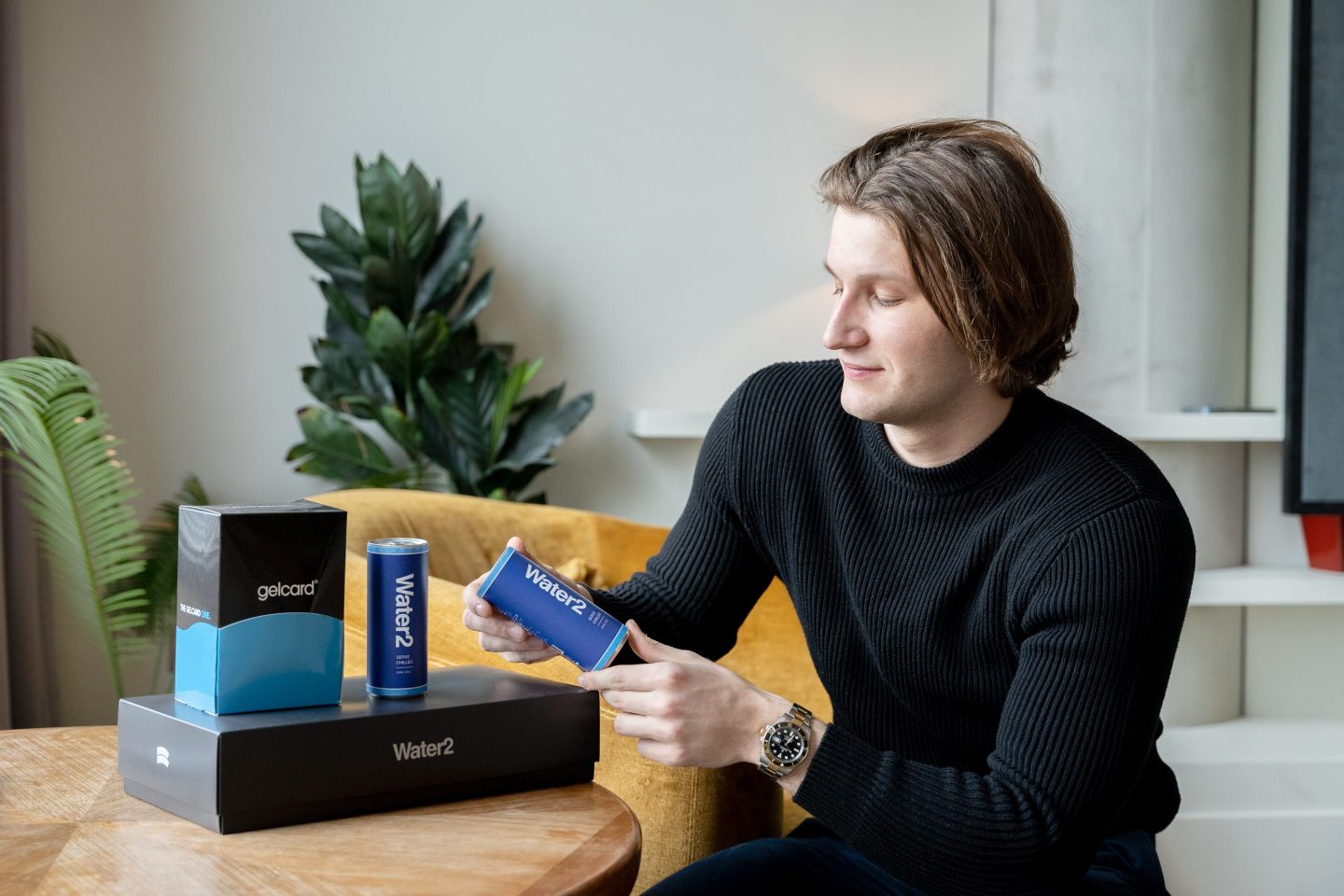 Gelcard and Water2 founder Charles Robinson is pictured with some of the products his companies make.