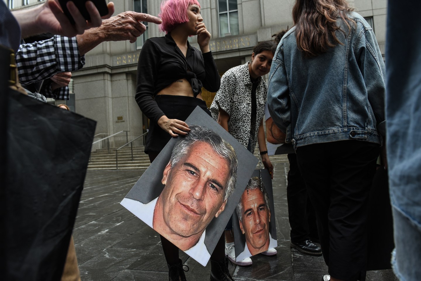 Protesters against Jeffrey Epstein.