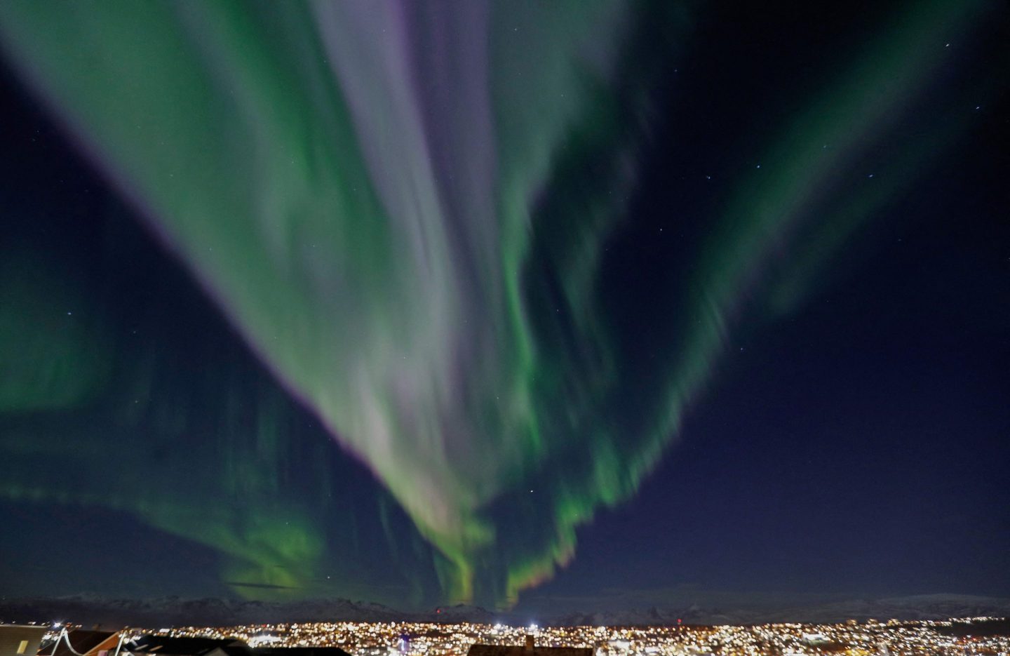 Northern lights are seen over Tromsoe, Norway.