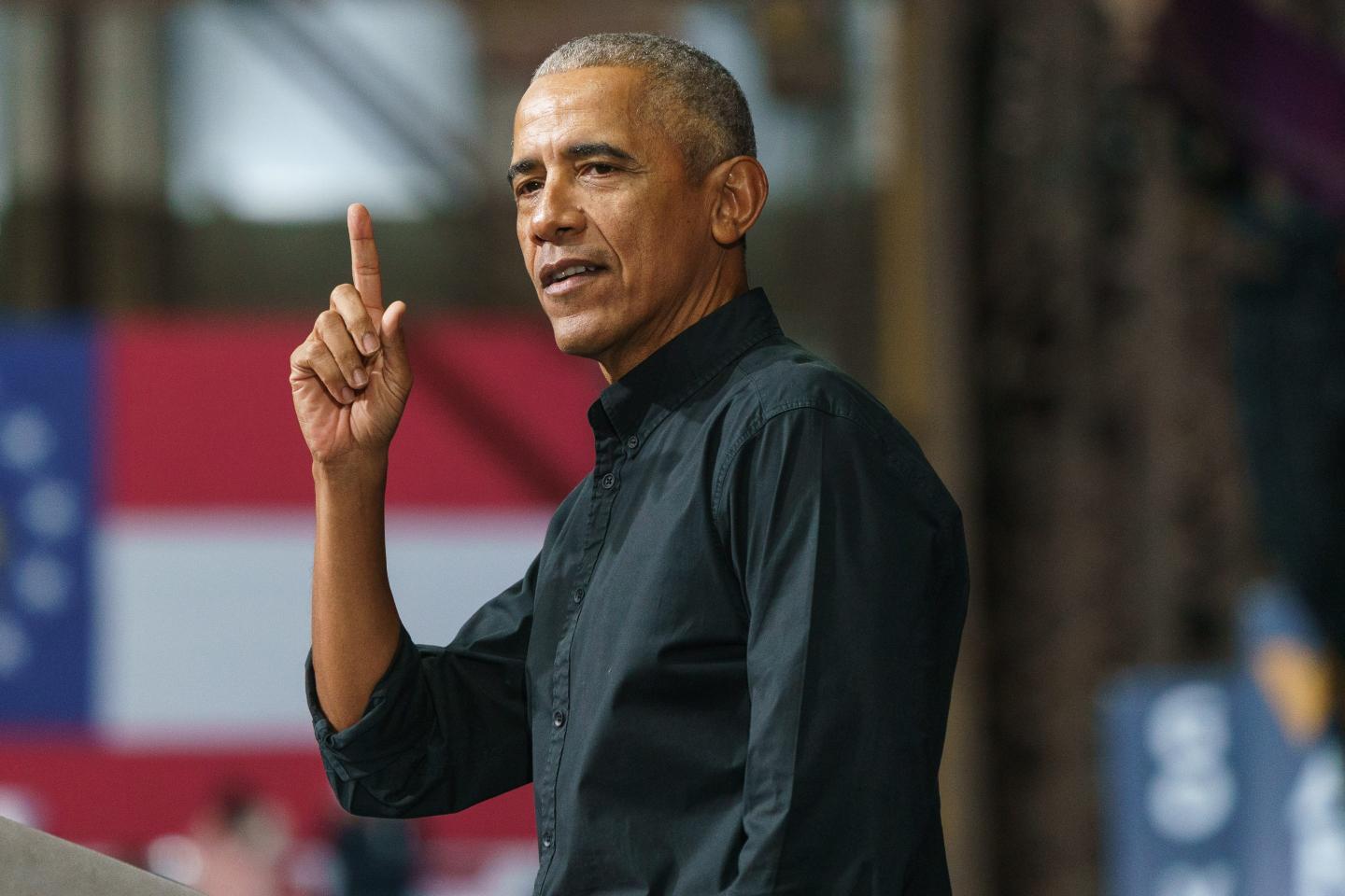 Former U.S. President Barack Obama speaks during a campaign rally for Senator Raphael Warnock, a Democrat from Georgia, in Atlanta