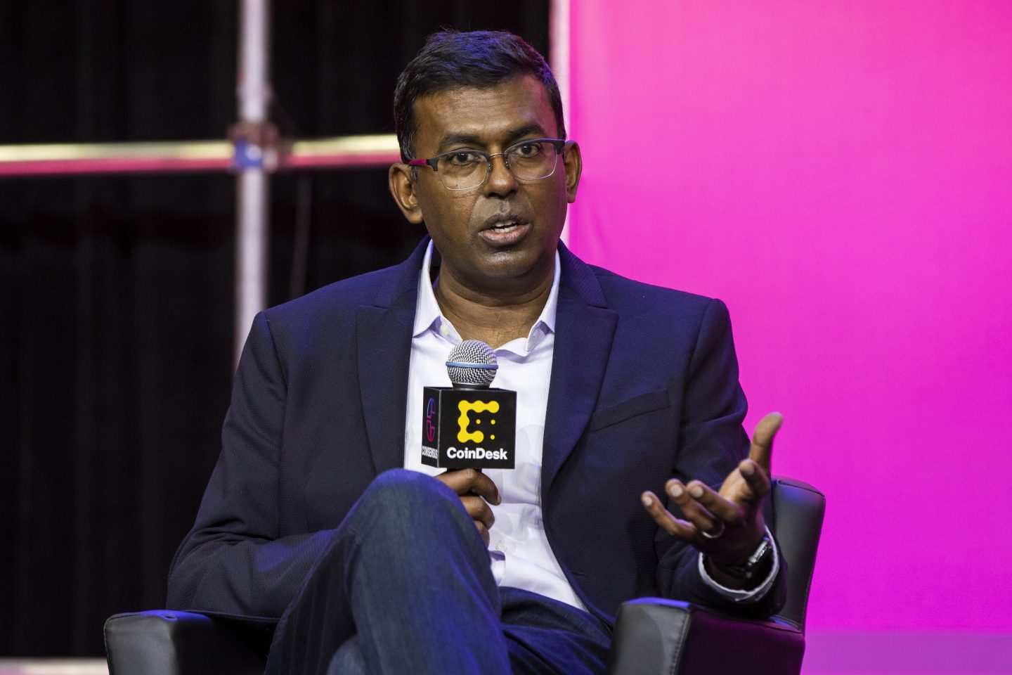 Raj Dhamodharan, head of crypto and blockchain at Mastercard, speaks during Consensus 2023.