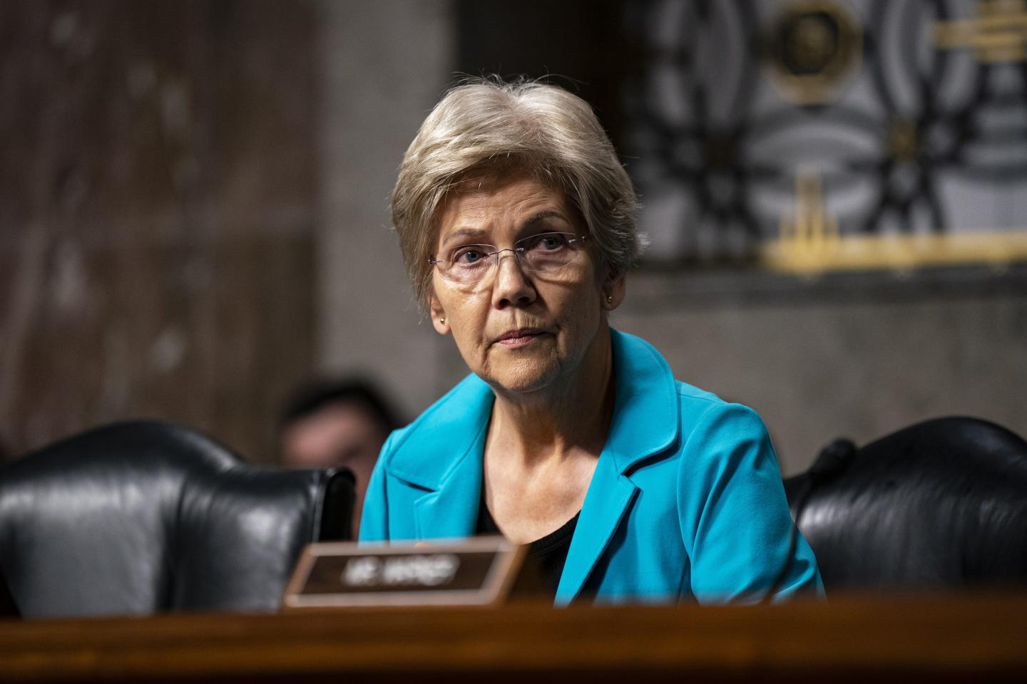 Sen. Elizabeth Warren listens during a Senate hearing.