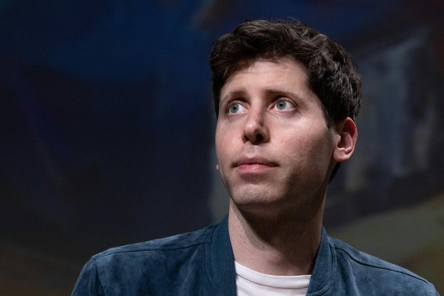 OpenAI CEO Sam Altman addresses a speech during a meeting, at the Station F in Paris