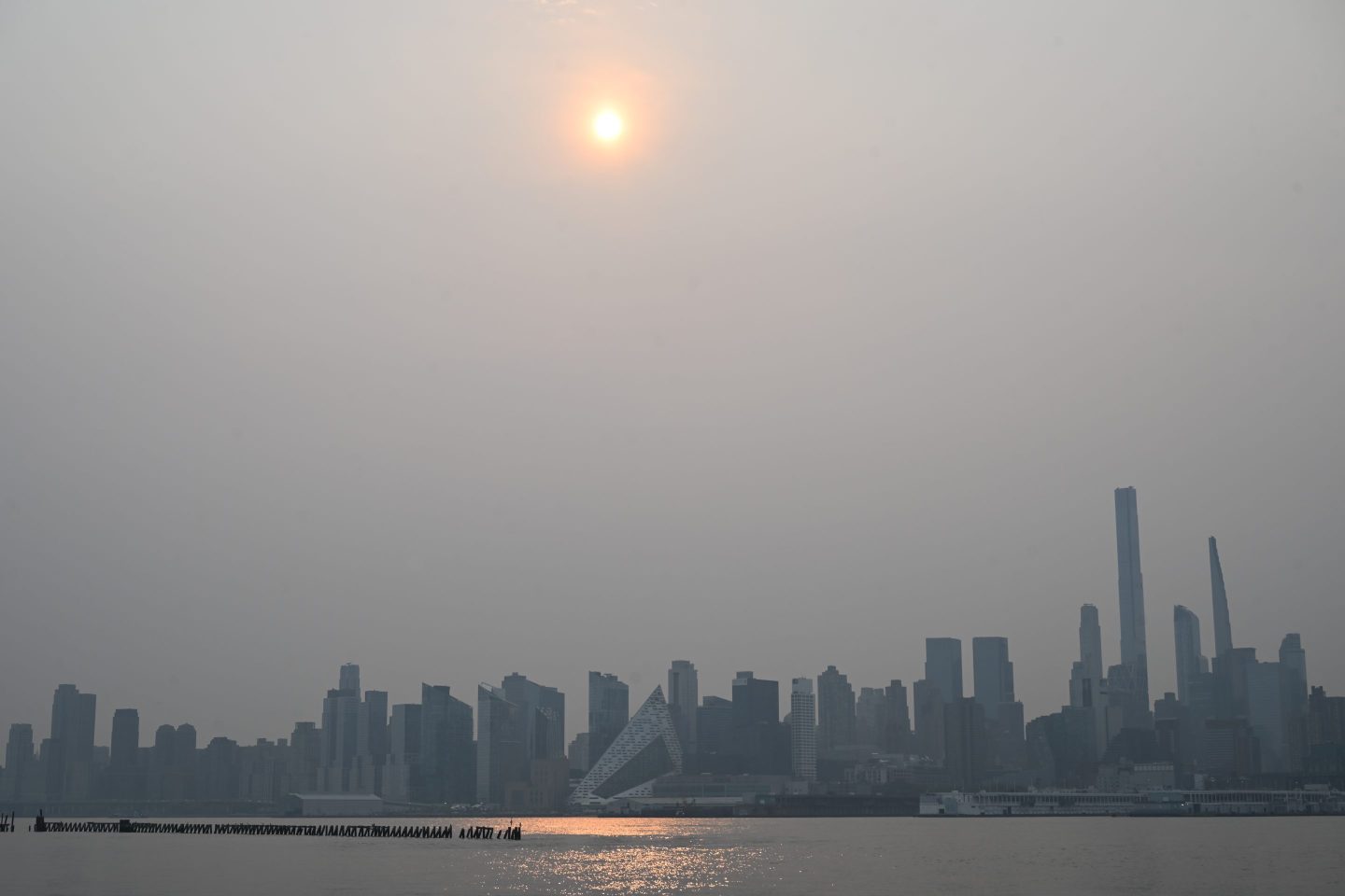 A view of orange haze illuminated the skies across the East on Tuesday morning as wildfire smoke from Canada spread across the East in New York, United States on June 6, 2023.