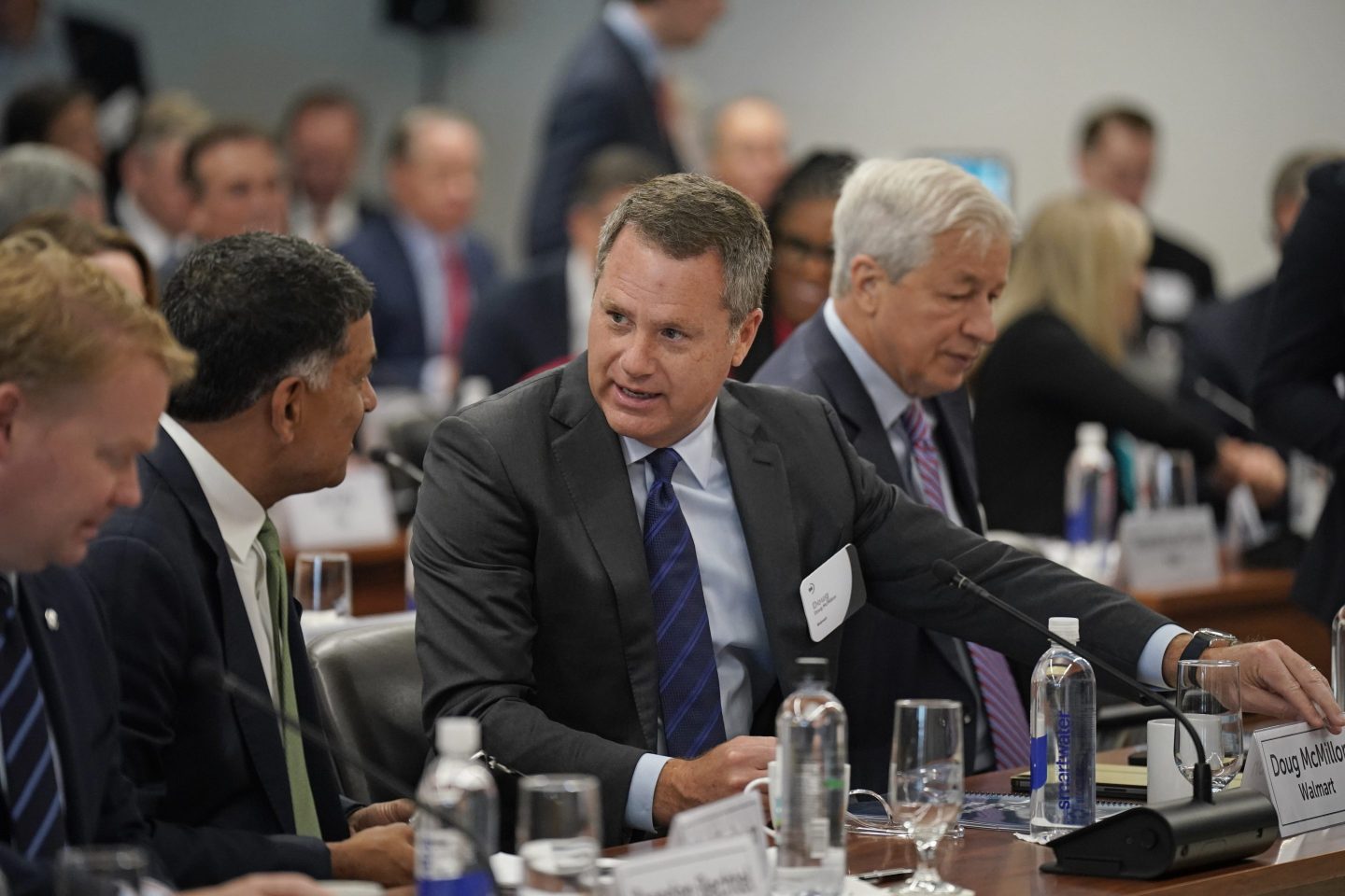 Walmart CEO Doug McMillon (centre), attends an event in Washington DC on Jun. 8.