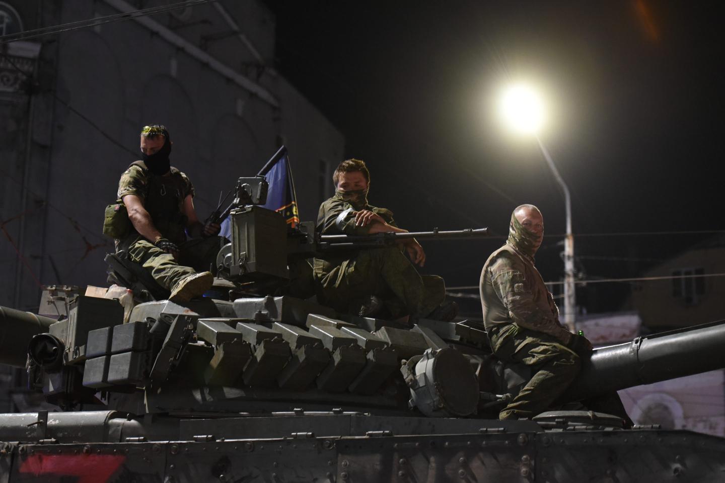 Members of the Wagner Group prepare to depart from the Southern Military District's headquarters and return to their base