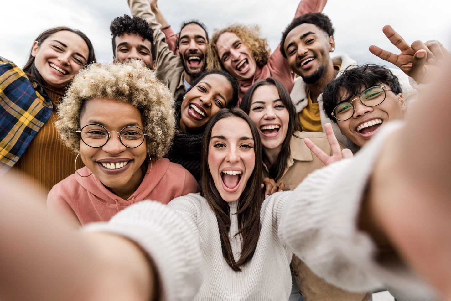 A group of people taking a selfie
