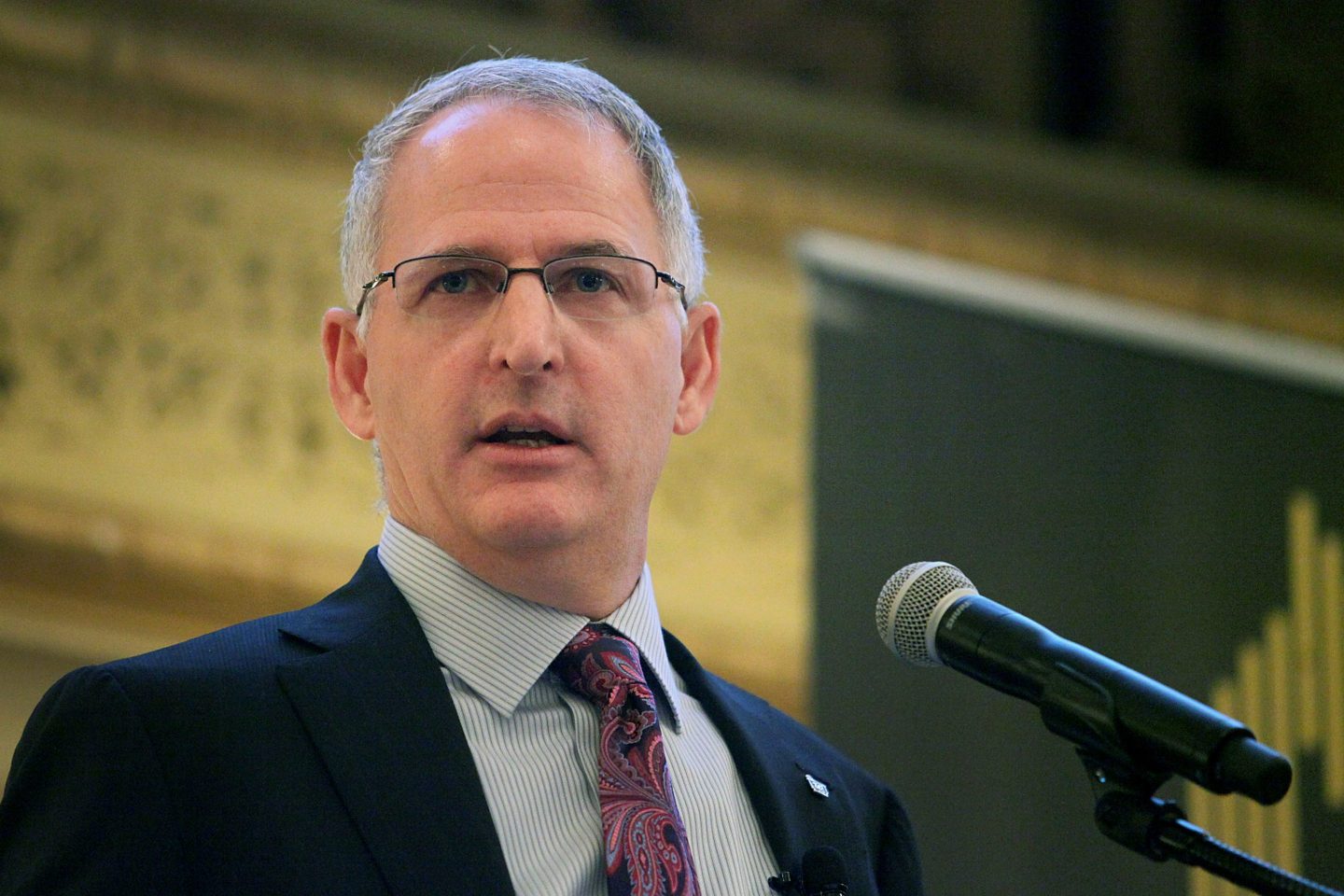Gregory "Greg" Wasson, left, president and chief executive officer of Walgreen Co., speaks at the Executives Club of Chicago in Chicago, Illinois, U.S., on Thursday, March 8, 2012.