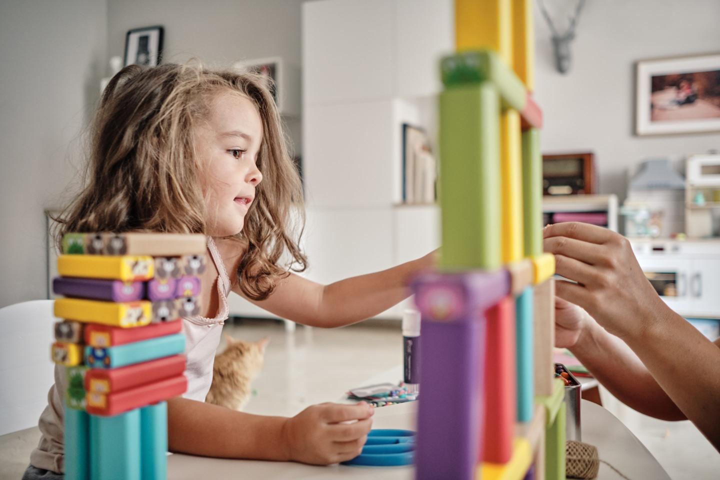 kid playing with blocks