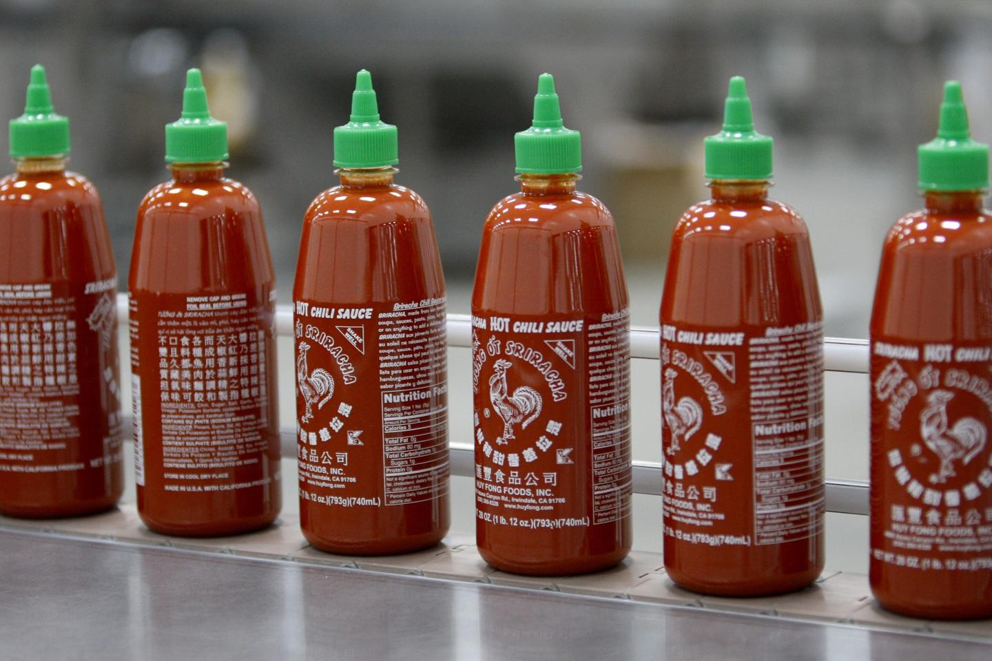 Sriracha Hot Chili Sauce is bottled at the Huy Fong Foods plant on May 14, 2014 in Irwindale, California.