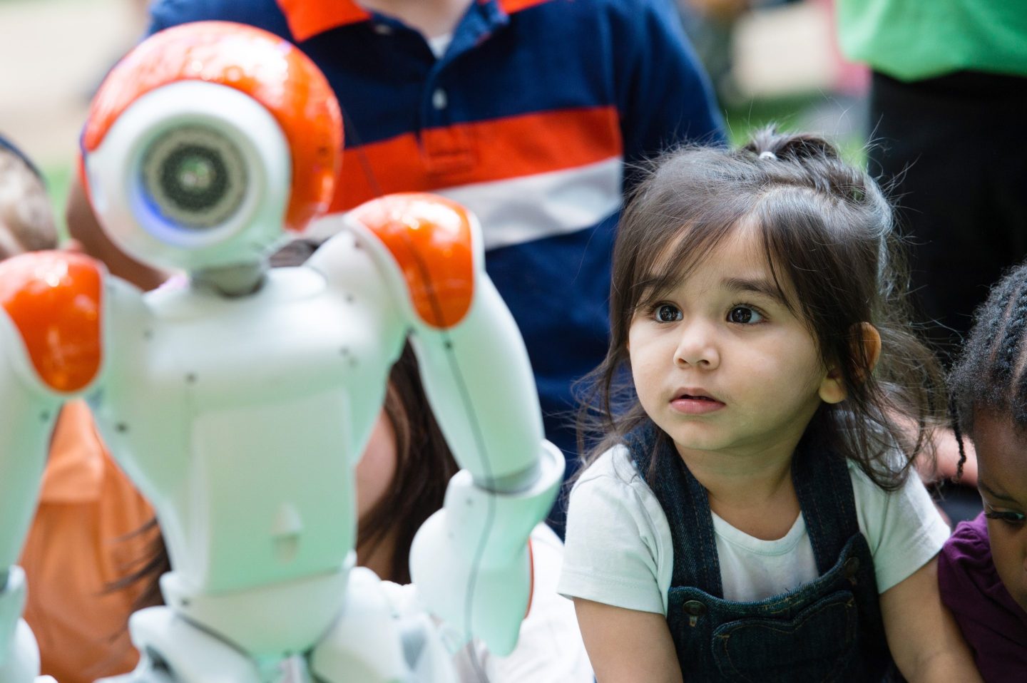 An interactive artificial intelligence storytelling robot interacts with children in London.