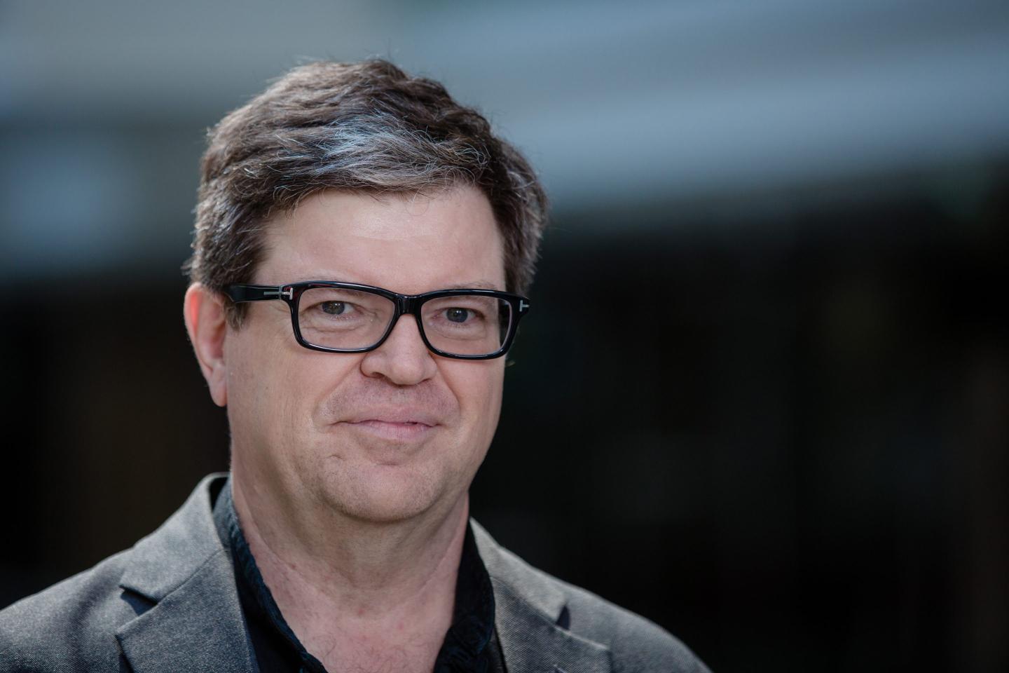 Yann Lecun, head of artificial intelligence (AI) research at Facebook Inc.,pauses during a Bloomberg Television interview at Bloomberg's Sooner Than You Think technology conference in Paris, France, on Wednesday, May 23, 2018.