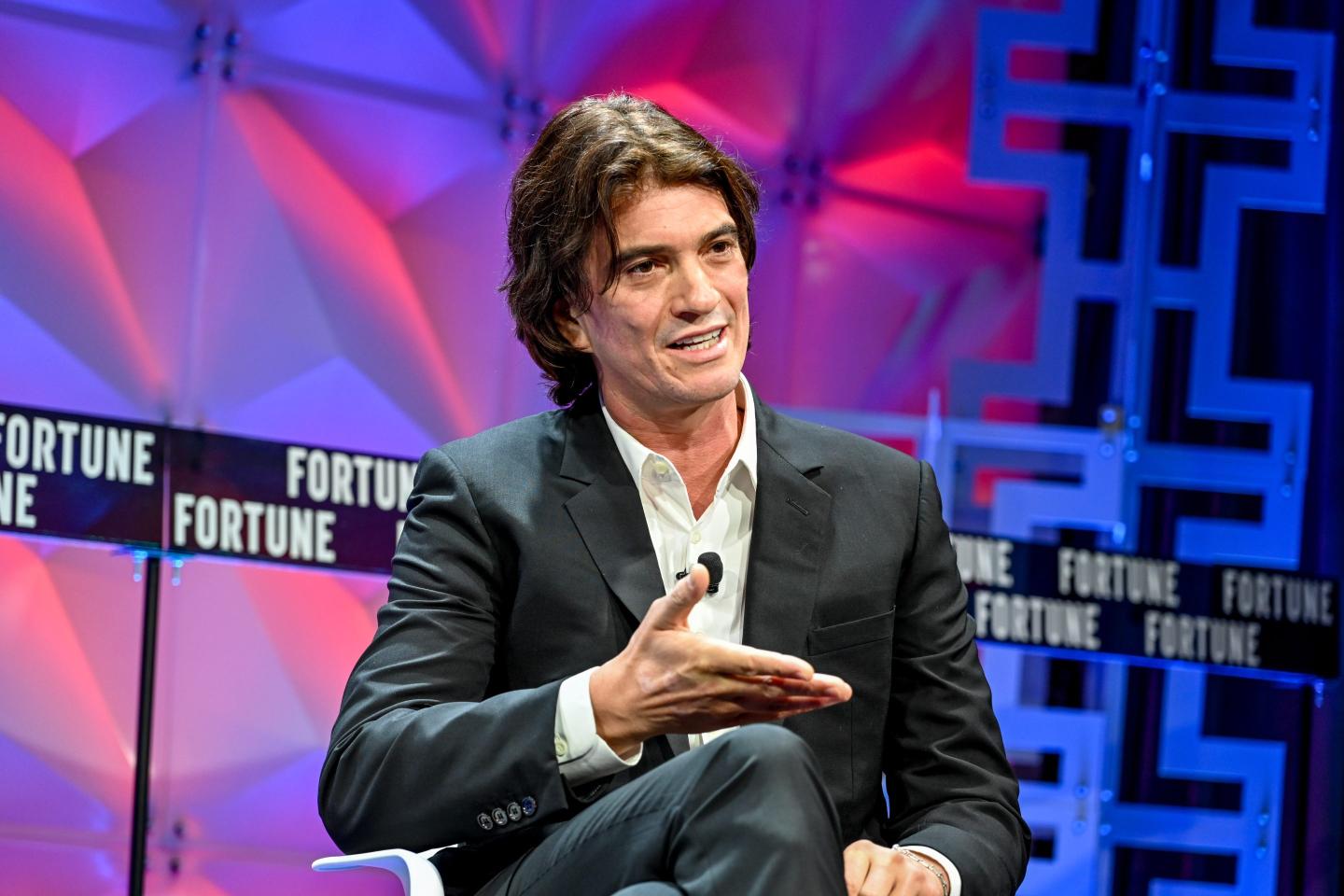 Adam Neumann says his new startup Flow will either "compete or partner" with WeWork. 