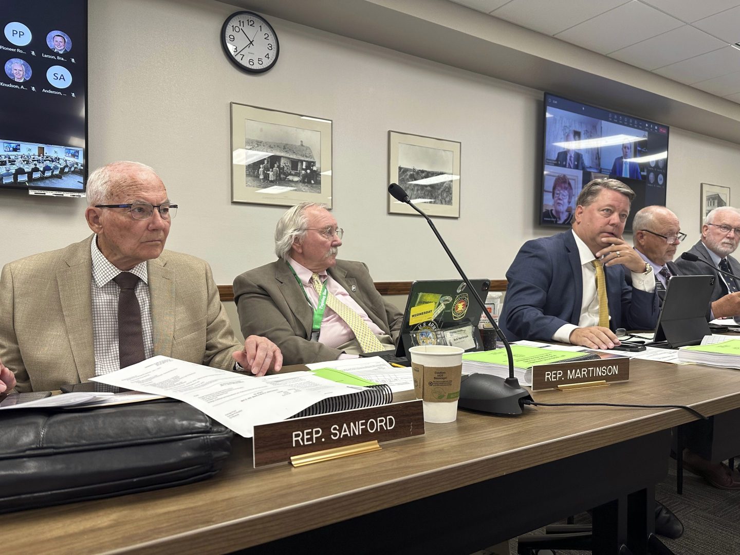 North Dakota Republican state Reps. Mark Sanford, Bob Martinson and Mike Nathe (from left) attend a meeting of the Legislature's Budget Section, on June 29, 2023, at the state Capitol in Bismarck, N.D.