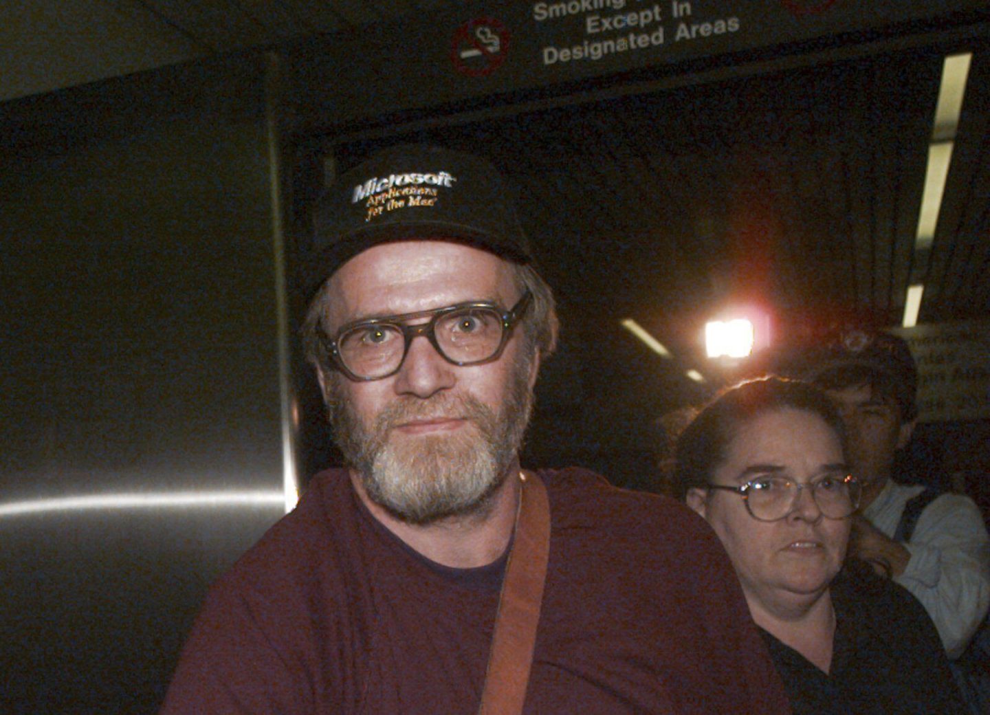 James Lewis is escorted through Boston's Logan Airport, on Oct. 13, 1995, after being released from the Federal Correctional Institution in Oklahoma.