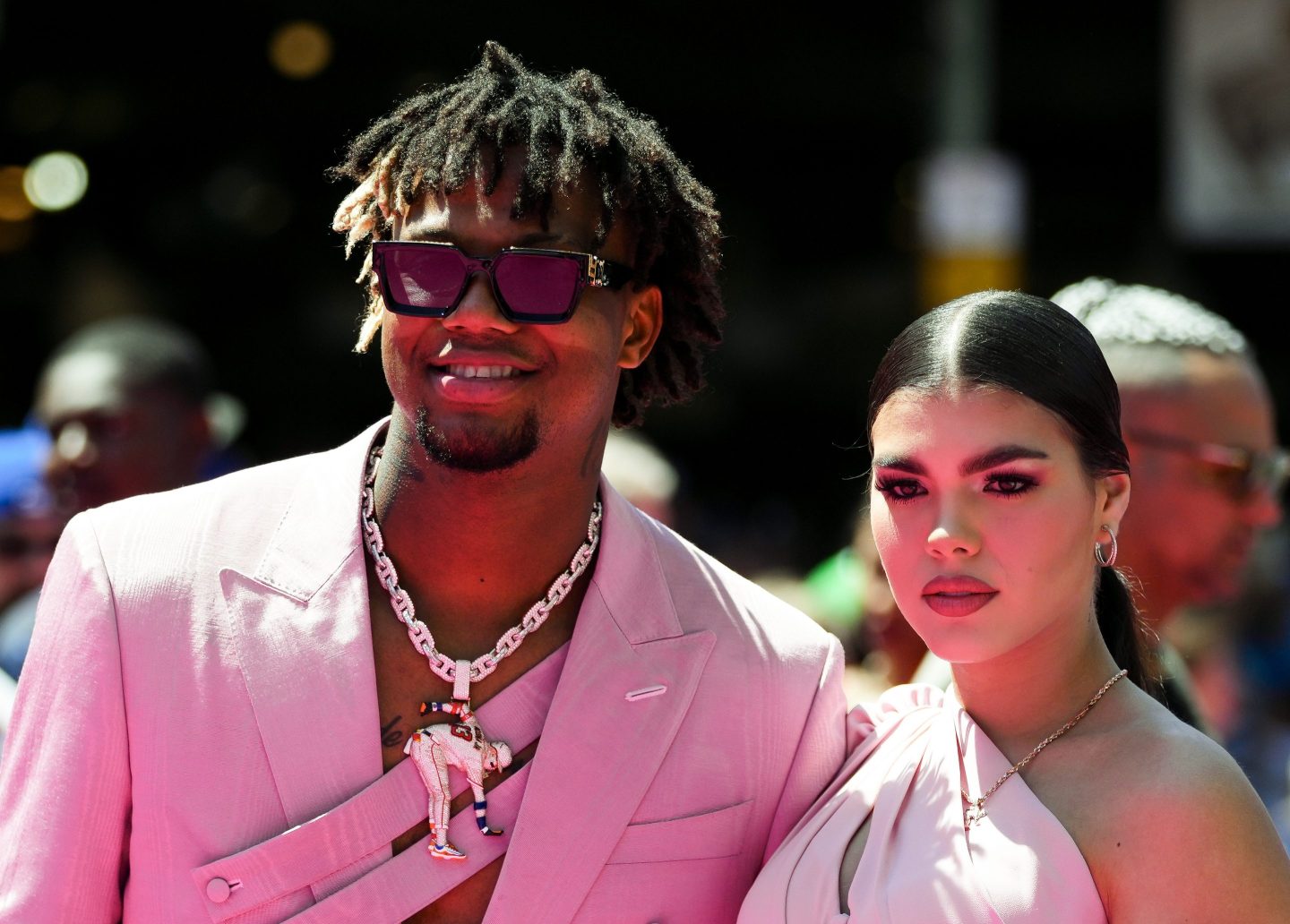 Atlanta Braves' Ronald Acuña Jr. walks with fiancee Maria Laborde during the baseball All-Star Game red carpet show on July 11, 2023, in Seattle.