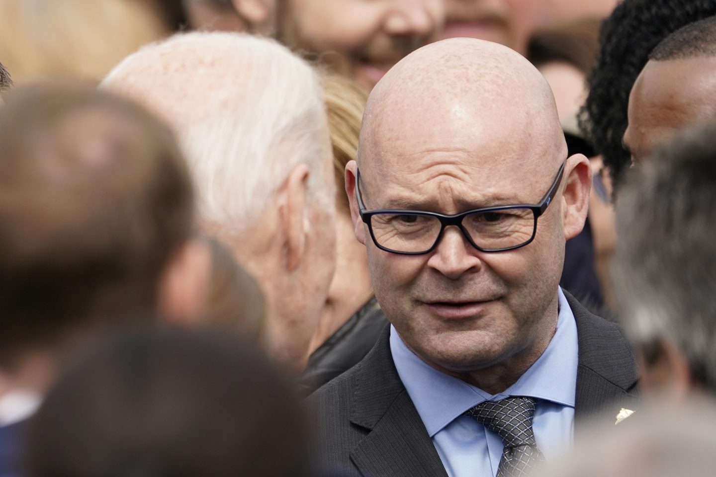 President Joe Biden, center left, talks with Teamsters union President Sean O'Brien, facing, after he spoke about strengthening the supply chain with improvements in the trucking industry, April 4, 2022, on the South Lawn of the White House.
