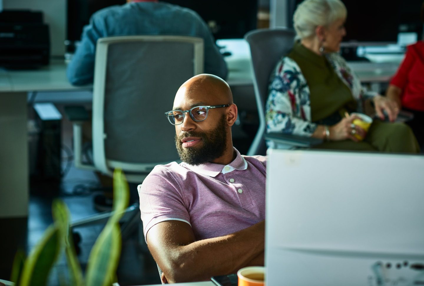 man at desk in office