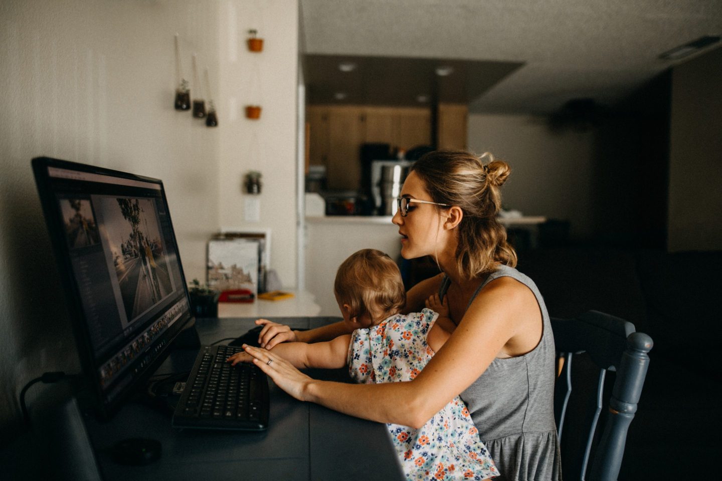 Mom with baby at laptop