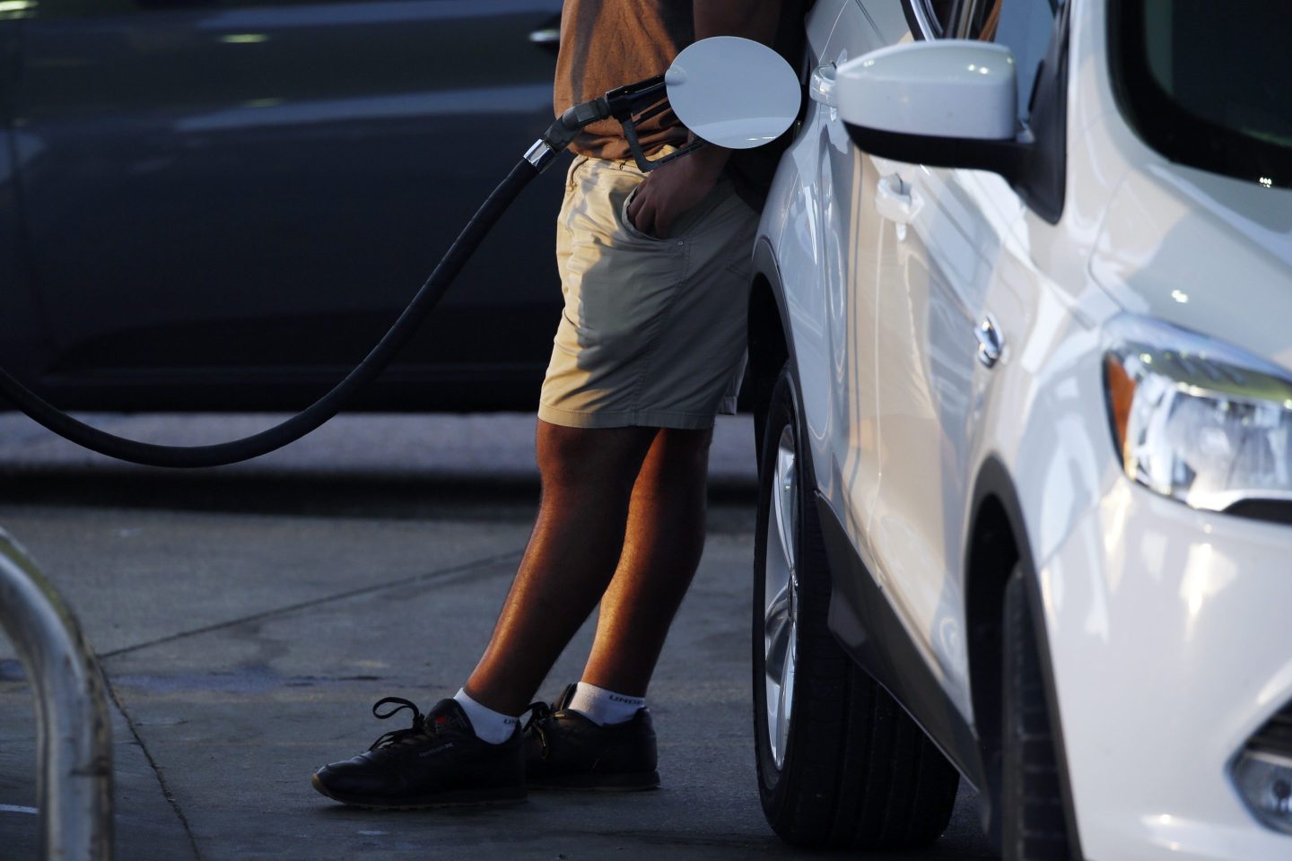 A customer refuels a vehicle at a Thornton's Inc. gas station in New Albany, Indiana, U.S., on Thursday, June 27, 2019. The national average for unleaded fuel is $2.72 a gallon, down 15 cents from last year's Fourth of July holiday. The lower prices are motivating a record number to hit the road, with 41.4 million commuters expected to travel by automobile, according to AAA. Photographer: Luke Sharrett/Bloomberg via Getty Images