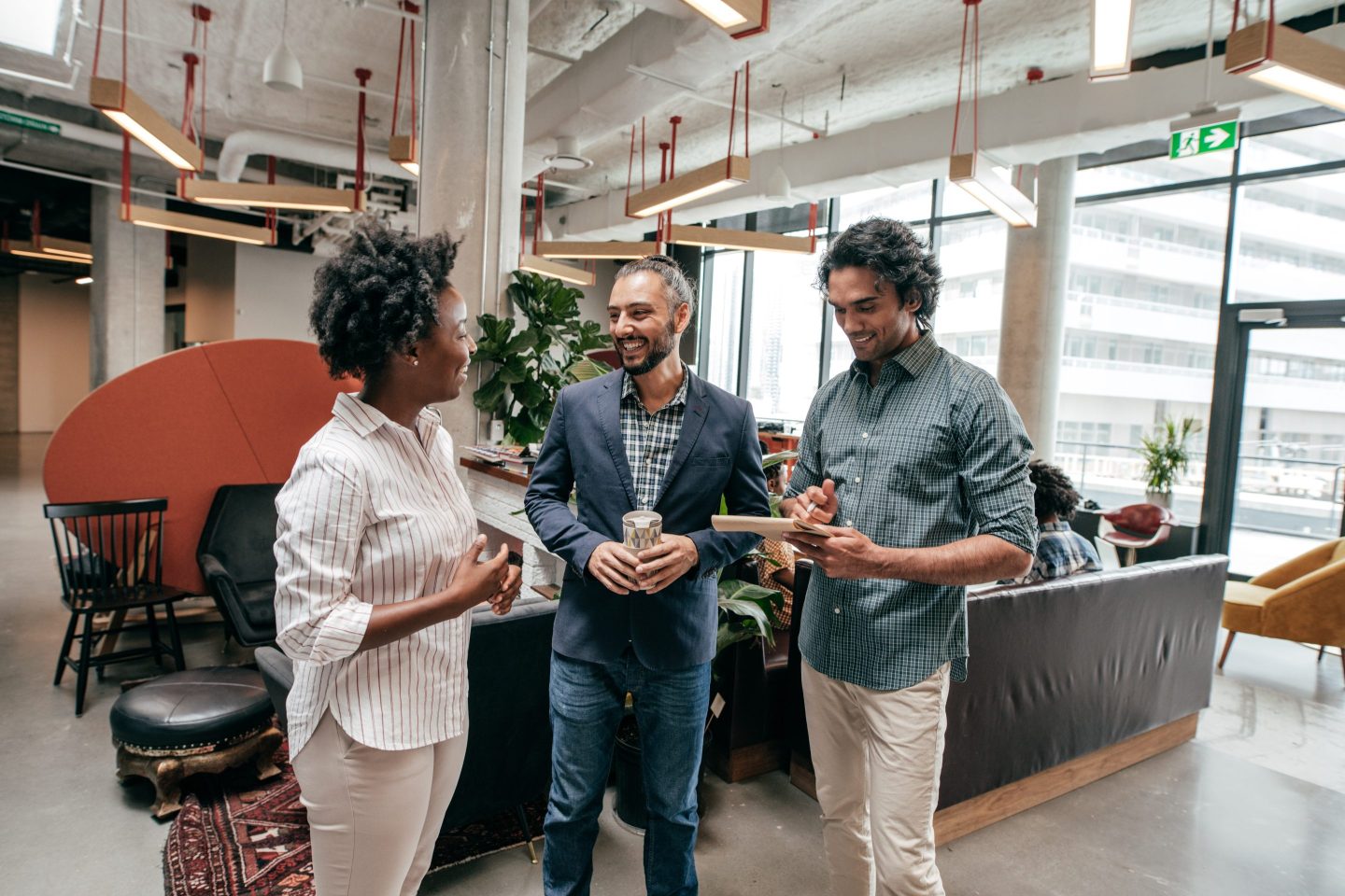 people chatting in office