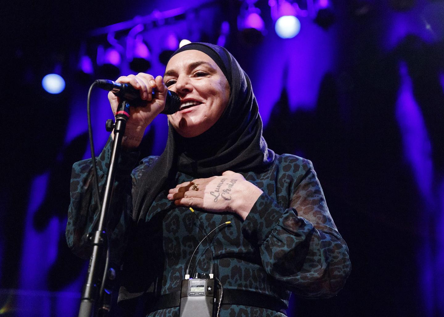 woman performing onstage