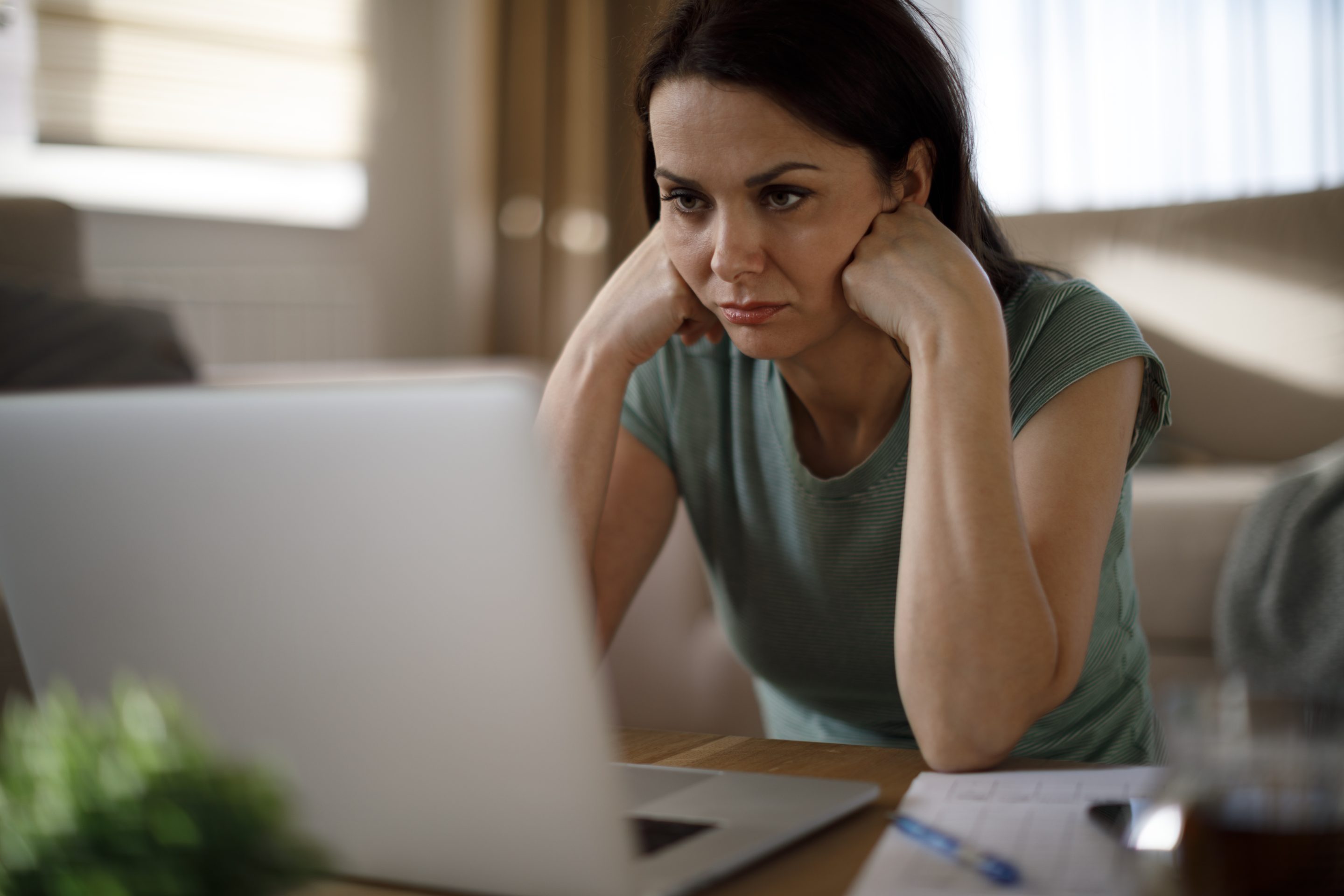 woman frustrated at computer