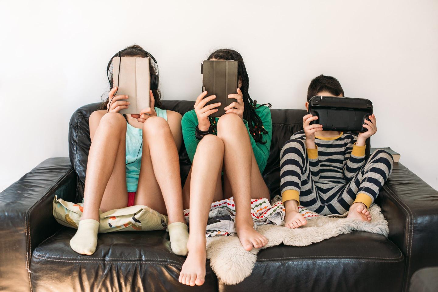 Children on electronic devices