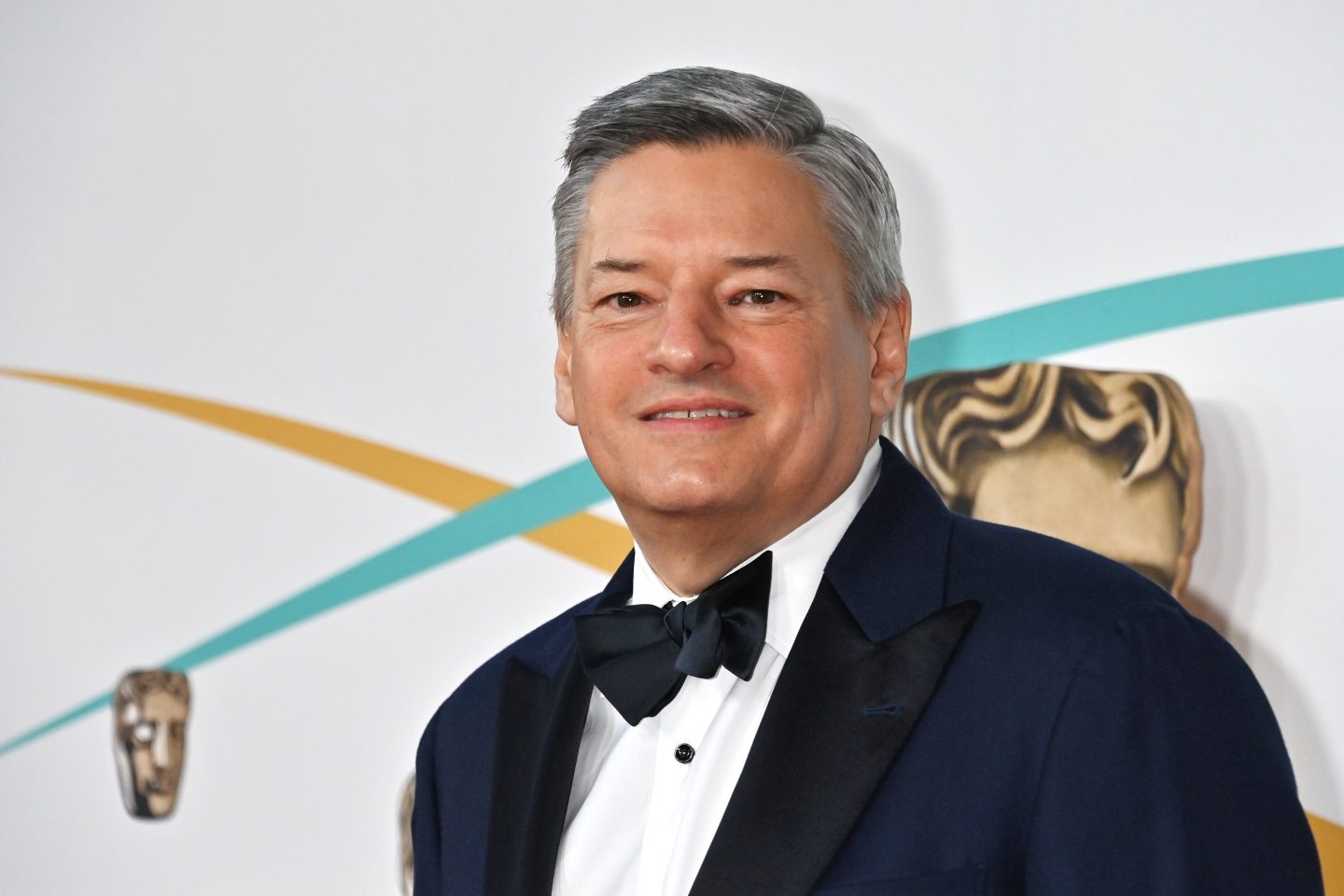 Netflix CEO Ted Sarandos wearing a tuxedo.