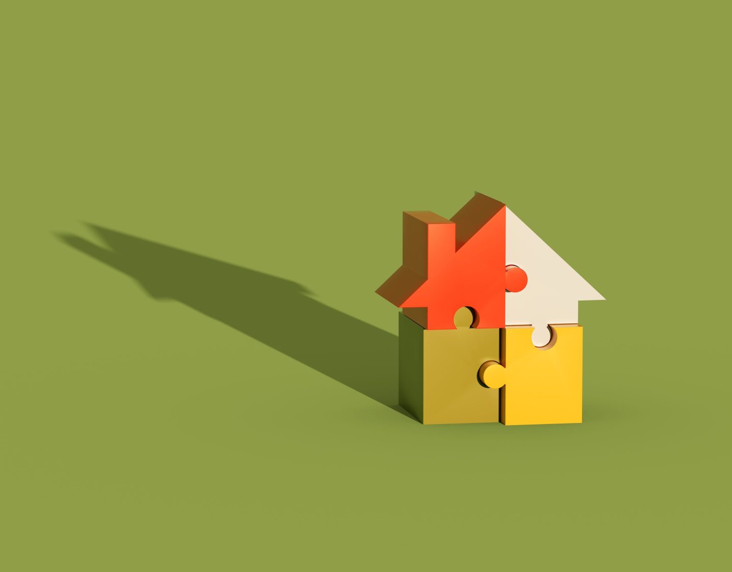 Model of a single-family home made up of puzzle pieces