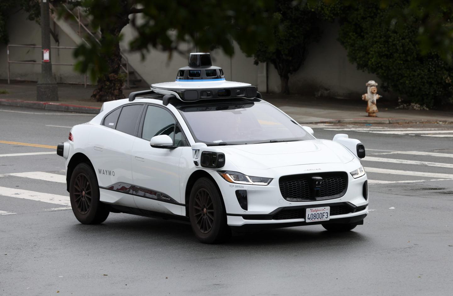 A Waymo autonomous vehicle drives along Masonic Avenue on April 11, 2022 in San Francisco, California.