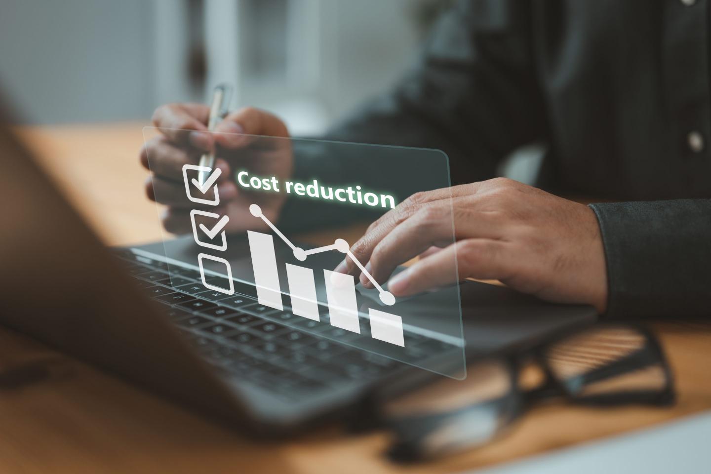 businessman using a computer to view a graph