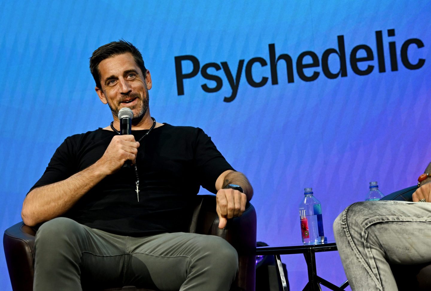 NFL quarterback Aaron Rodgers, who described taking ayahuasca as radically life-changing, event.