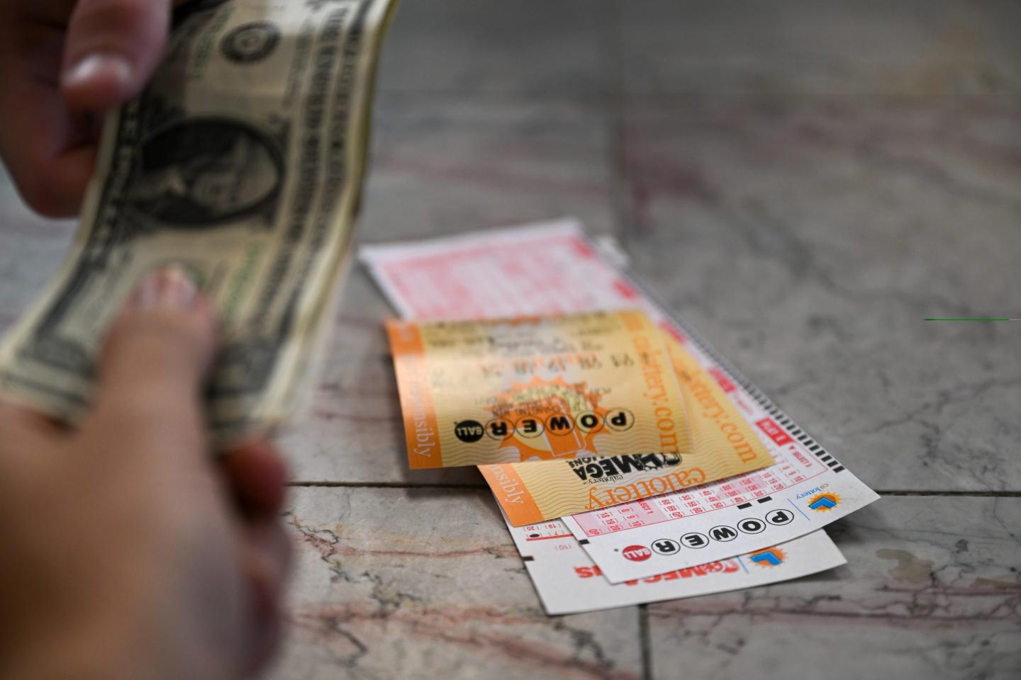 Financial planner to winners of tonight’s $910 million Mega Millions jackpot: ‘Don’t quit your job’
