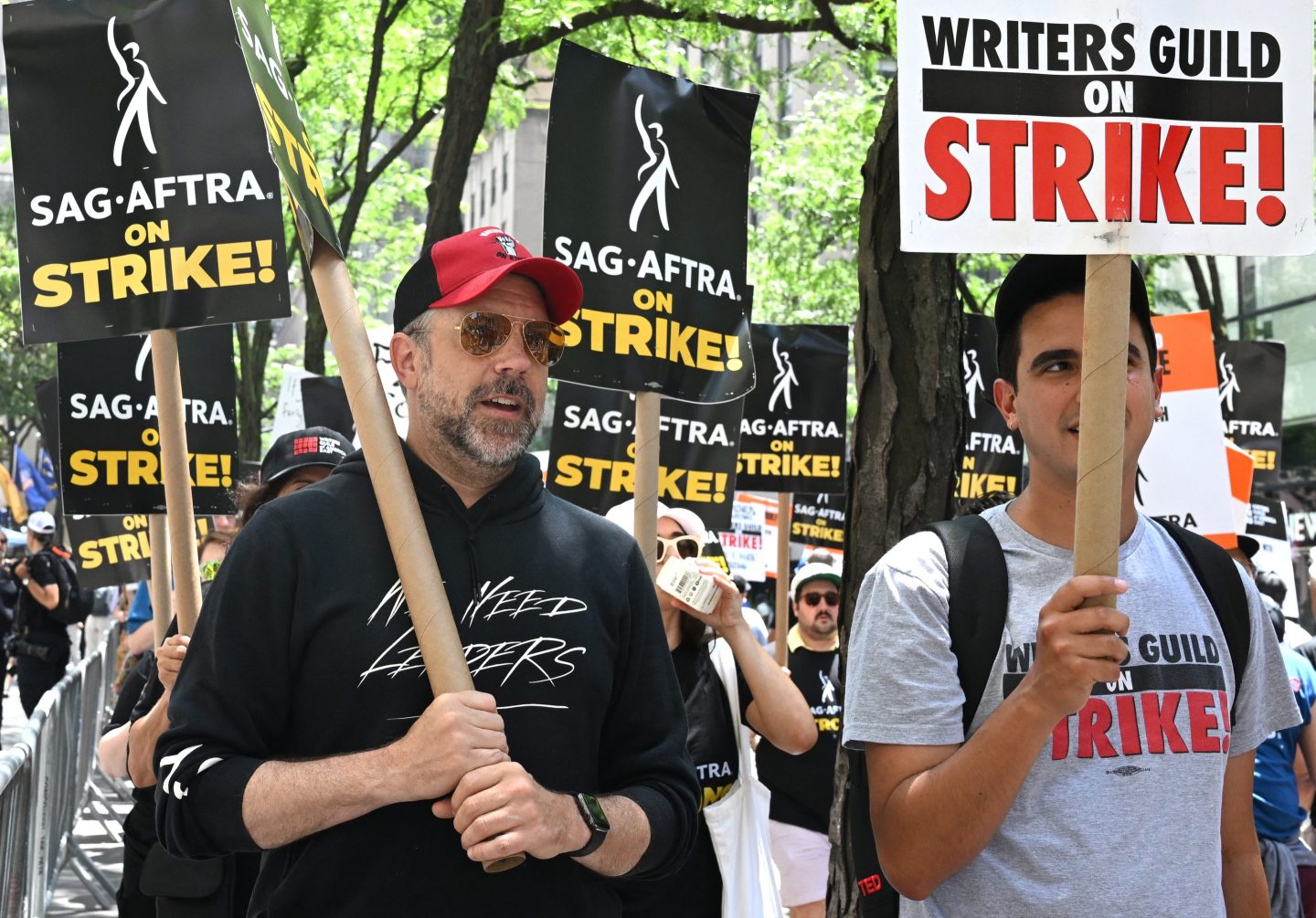 Actor Jason Sudeikis joins members of the Writers Guild of America and the Screen Actors Guild as they walk a picket line outside NBC Universal in New York City on Jul. 14.