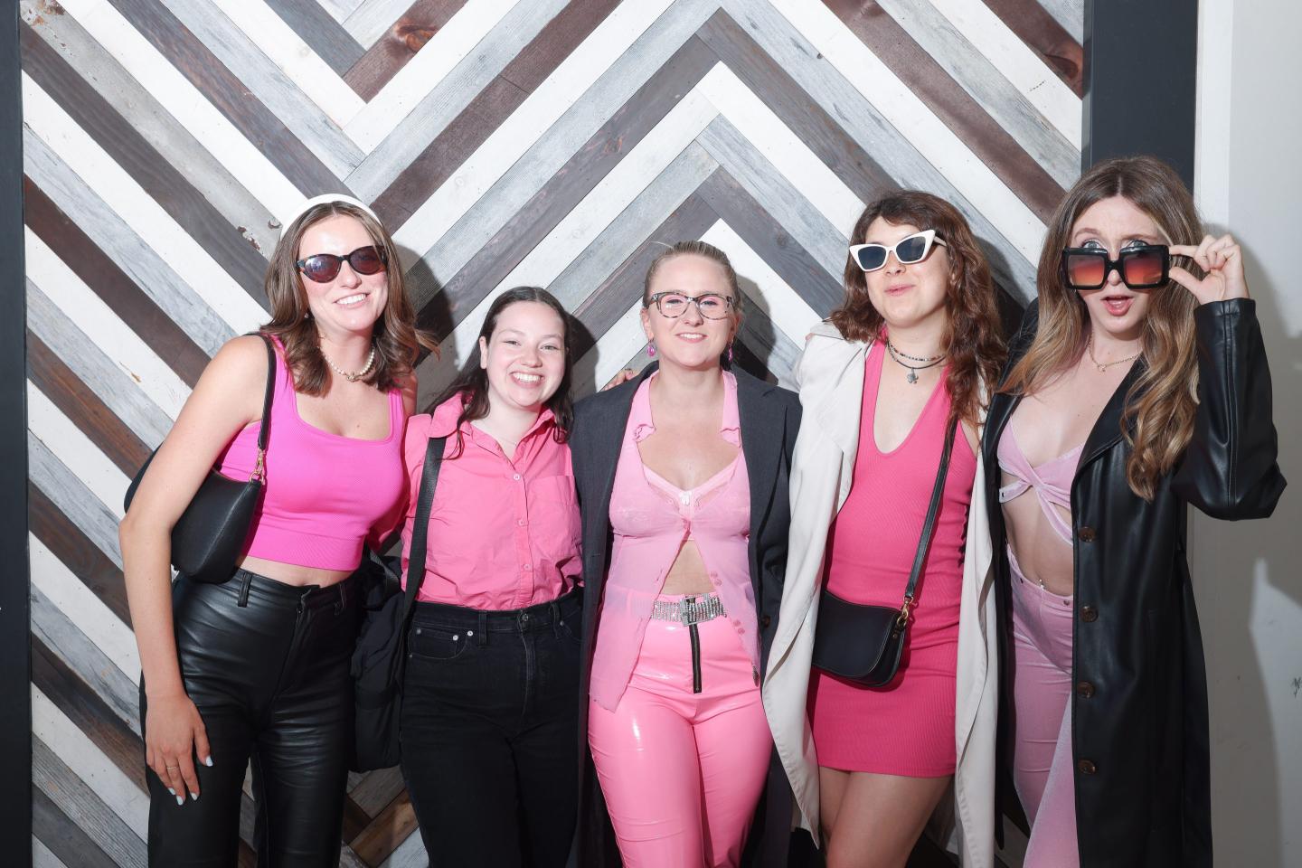 Fans dressed as "Barbenheimer," a mix between "Barbie" and "Oppenheimer" outfits