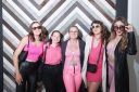 Fans dressed as "Barbenheimer," a mix between "Barbie" and "Oppenheimer" outfits