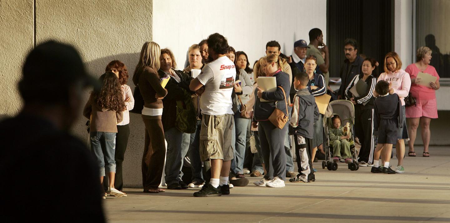 At 6:30 AM, half an hour before the doors open at the Federal Building in Westwood people are already lined up in an effort to process their passports