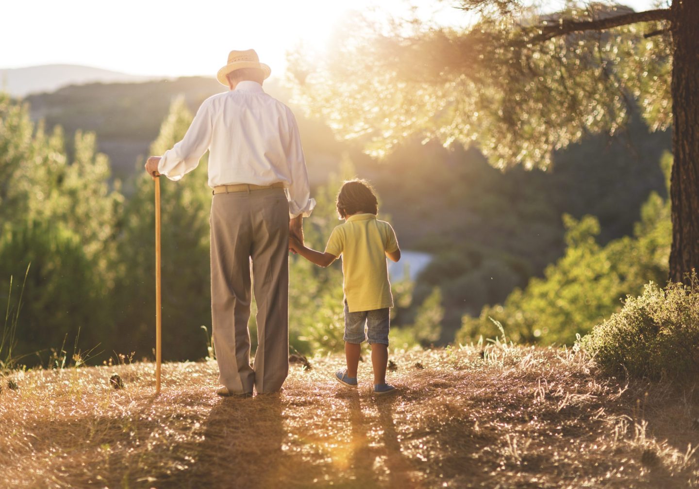 Grandfather walking with his grandson