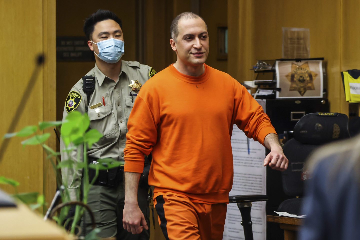Nima Momeni, the man charged in the fatal stabbing of Cash App founder Bob Lee, makes his way into the courtroom for his arraignment in San Francisco on May 2, 2023.