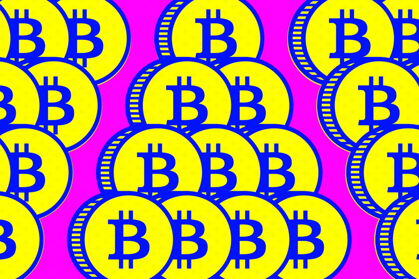 Pictures of coins stacked on top of each other with Bitcoin logo affixed.