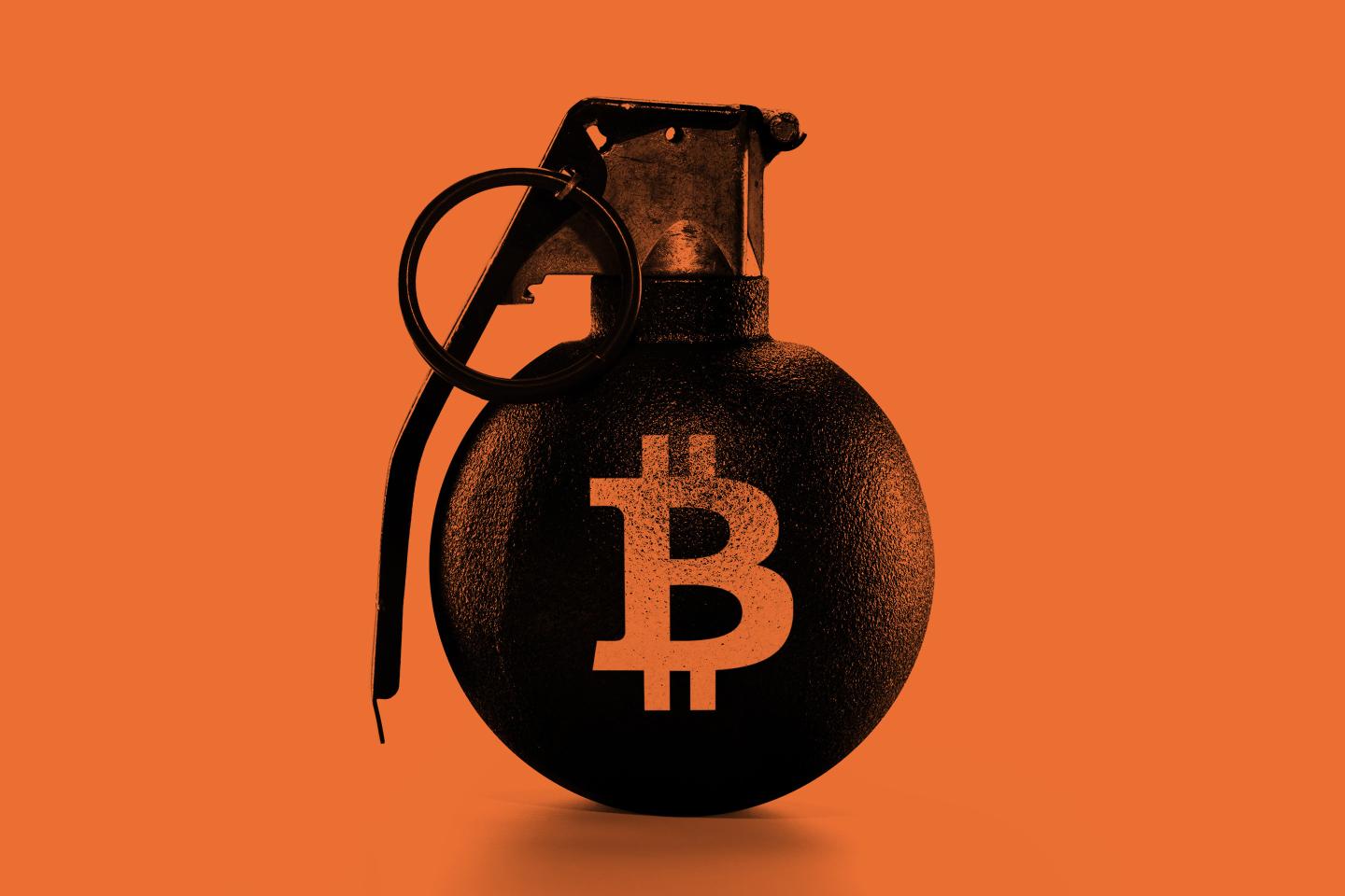 A grenade with a Bitcoin symbol painted on.