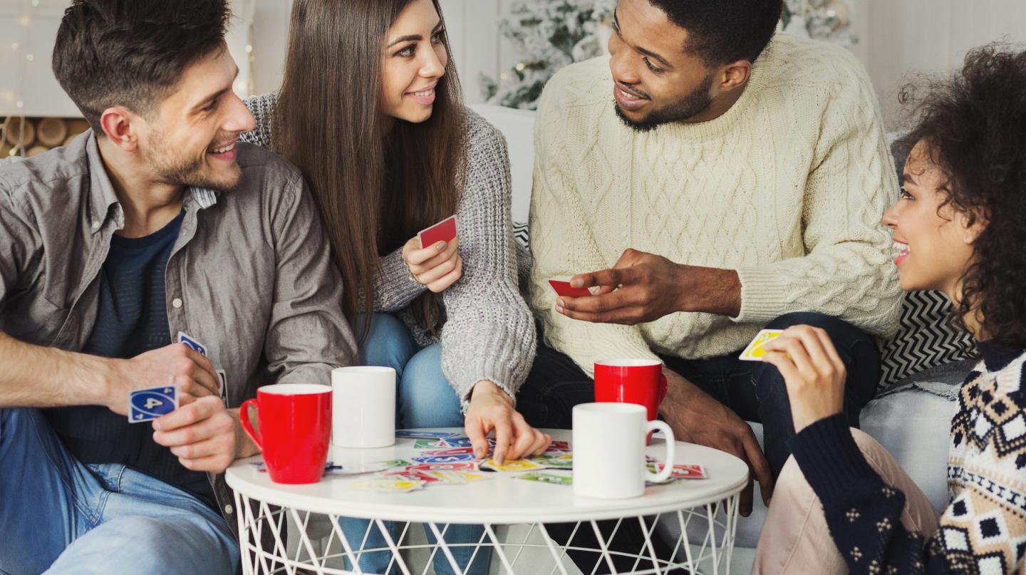 Friends playing UNO