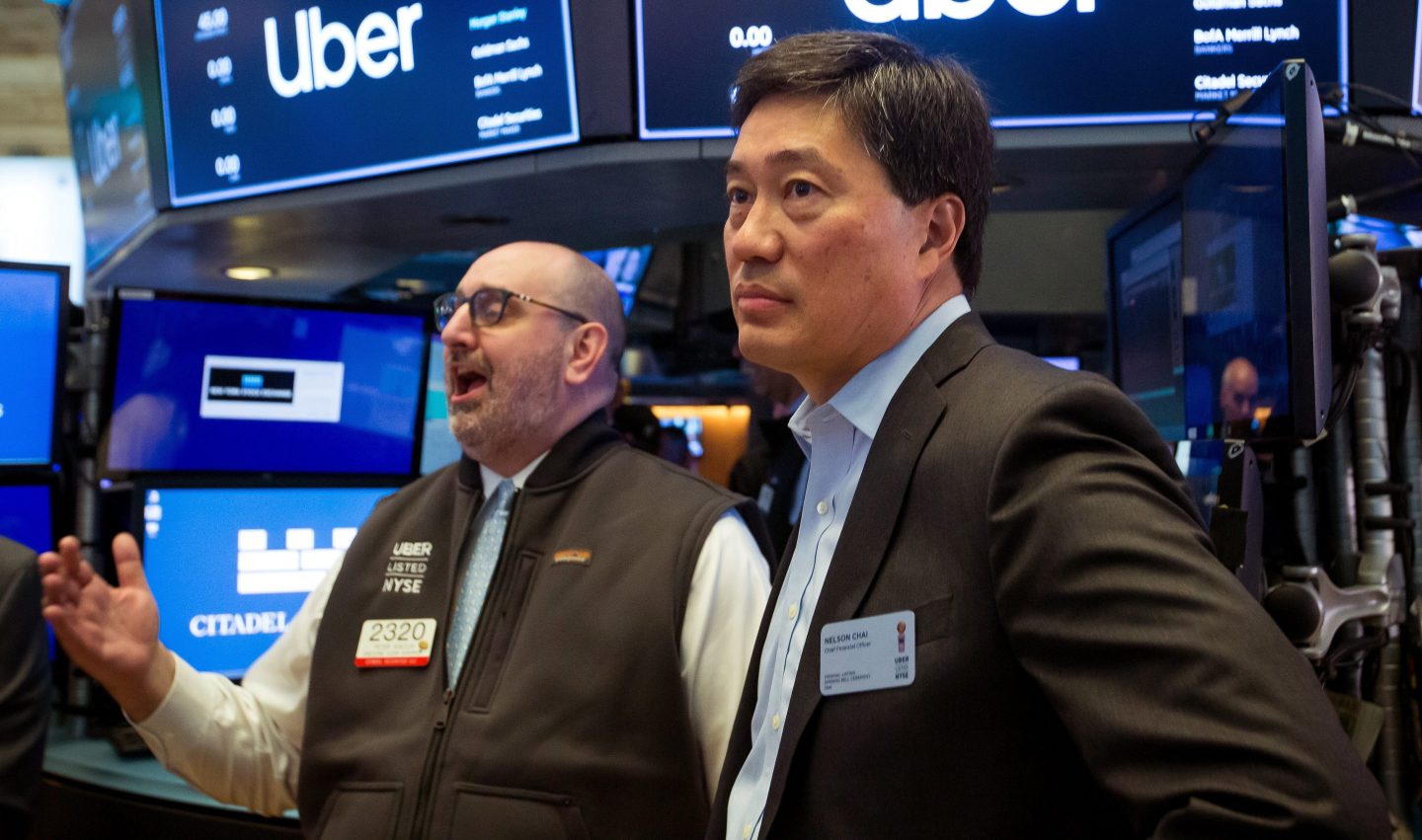 Nelson Chai, chief financial officer of Uber Inc., watches trading during the company's initial public offering on the floor of the New York Stock Exchange on May 10, 2019.