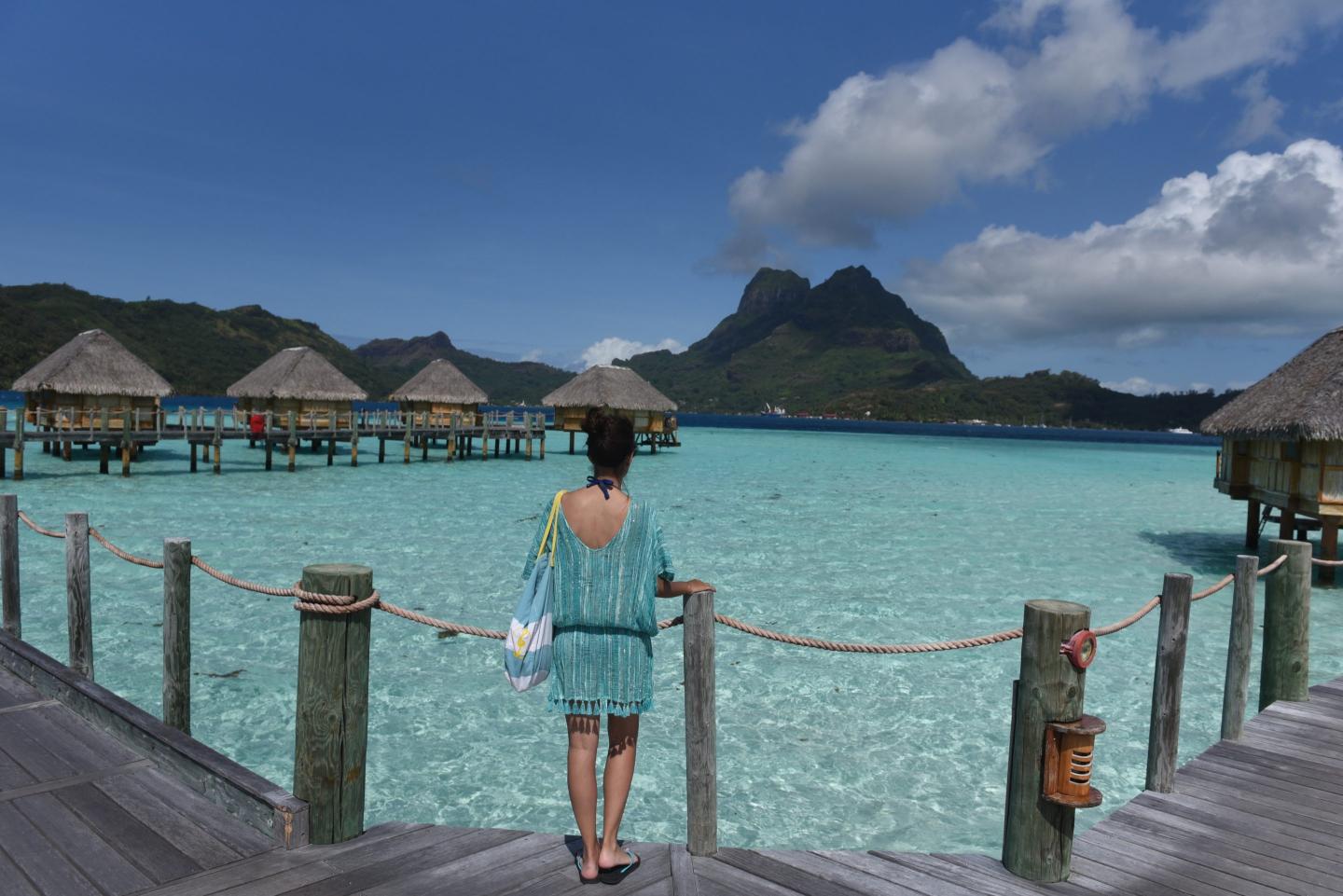 Inflation? Uncertain economy? No problem.  Americans are vacationing overseas like never before