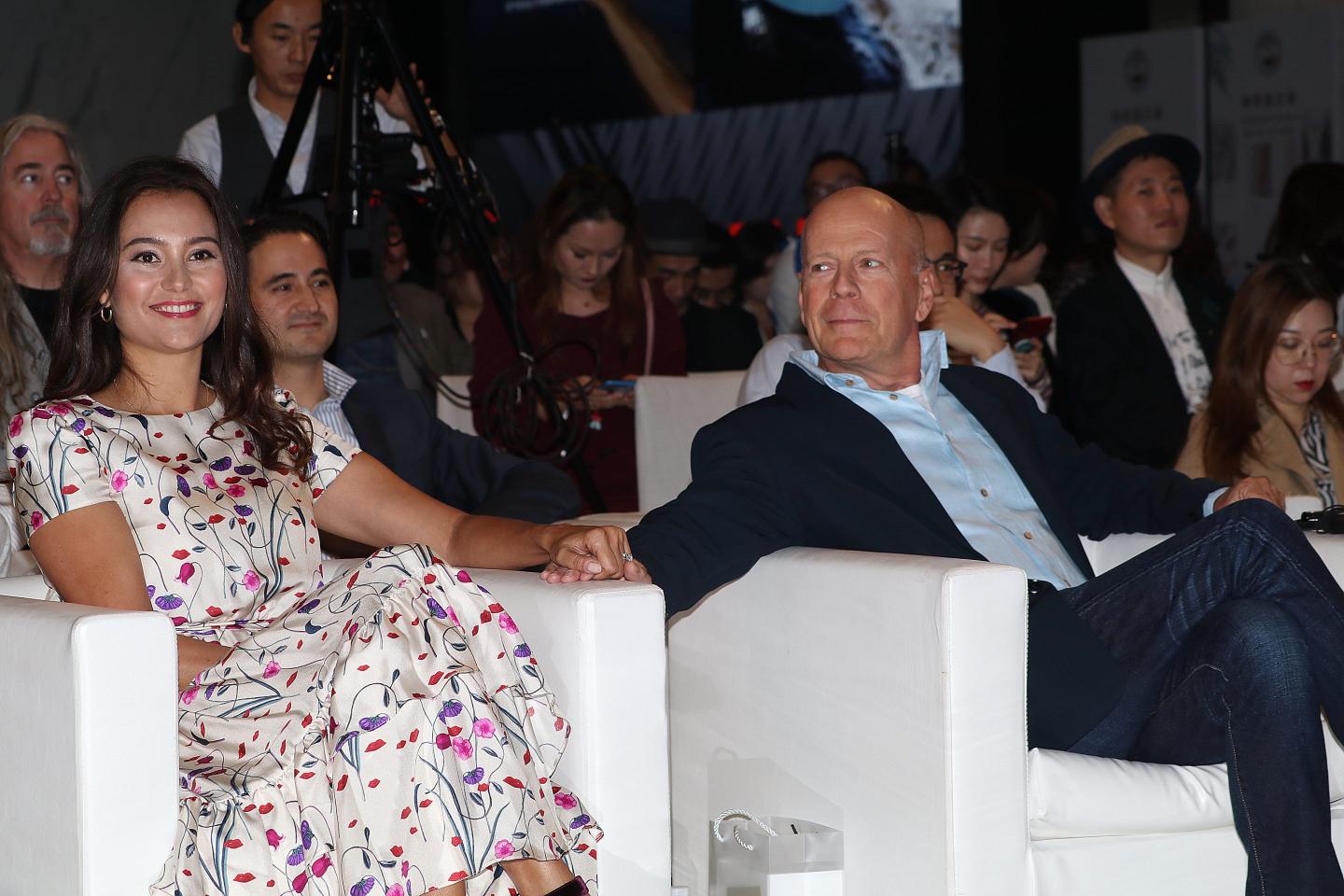 Bruce Willis and wife Emma Heming Willis attend an event in Shanghai, November 4, 2019.