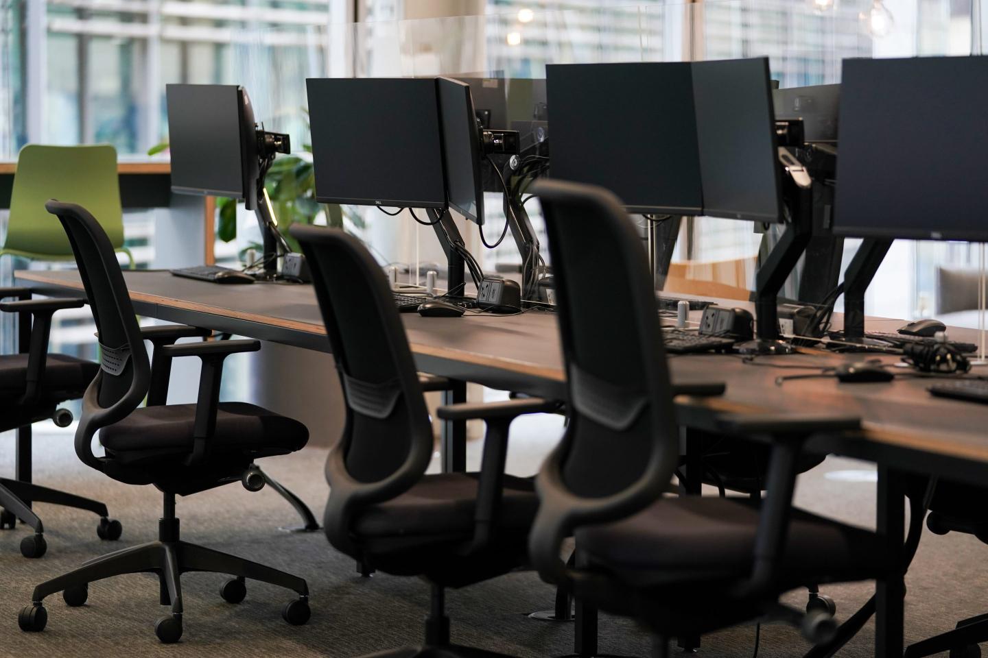 So few workers go into the office now that more than one-third of desks sit empty all week